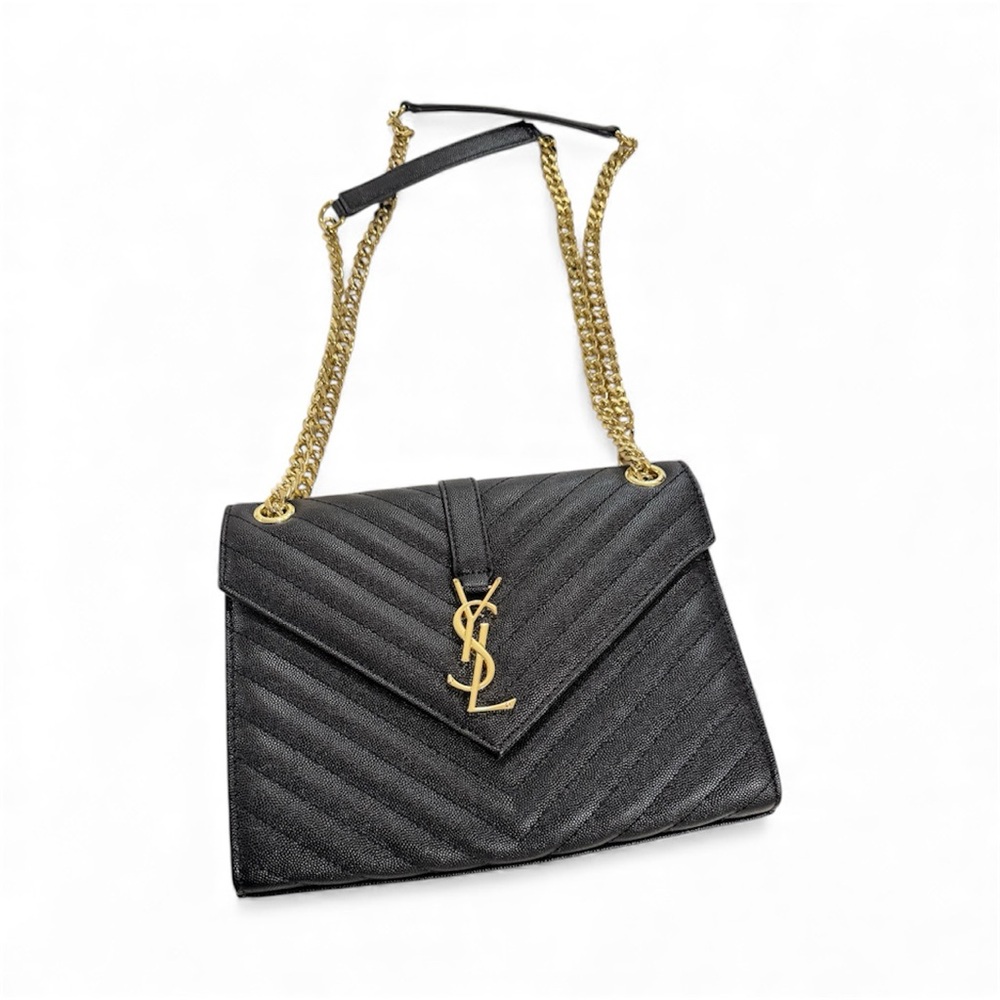 Elegant Black Chevron Shoulder Bag with Gold Accents